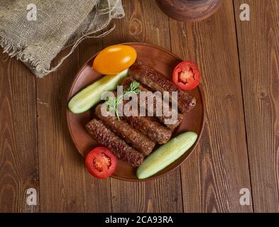 Bulgarian Kebapchetta - small sausages made of pork or beef. Stock Photo
