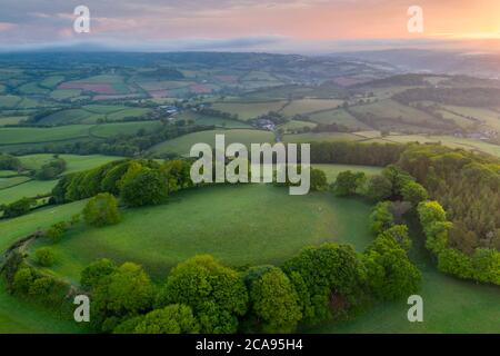 Cadbury Castle Iron Age Hillfort at dawn in spring, Cadbury, Devon, England, United Kingdom, Europe Stock Photo