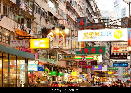 Causeway Bay, Hong Kong Island, Hong Kong, China - A crowded view of store signs and advertising billboards in a street view Stock Photo