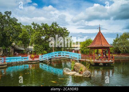 Carp pond and pavilion in Hualien sugar factory, taiwan Stock Photo