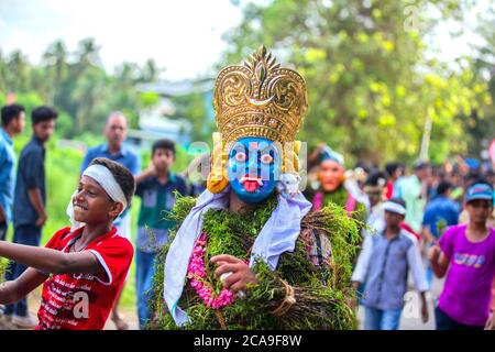 traditional kummatti folk dance performers during onam celebration,thrissur,kizhakkumpattukara kummatti,kerala,onam festival,india,pradeep subramanian Stock Photo