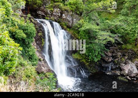 Inversnaid Waterfall cascading over The Arklet Burn as it falls into Loch Lomond,Loch Lomond and The Trossachs National Park, Stirling, Scotland Stock Photo