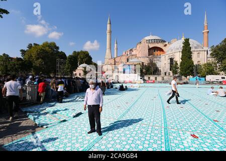 ISTANBUL, TURKEY - AUGUST 01, 2020: People visit and pray Hagia Sophia after its conversion to mosque Stock Photo