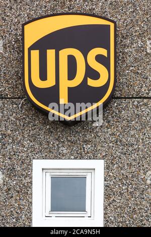 Holme, Denmark - June 5, 2019: UPS logo on a facade. United Parcel Service is the worlds largest package delivery company Stock Photo