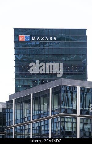 Paris, France - November 11, 2019: Mazars office building in Paris La Defense, France. Mazars is a global audit, accounting and consulting group Stock Photo