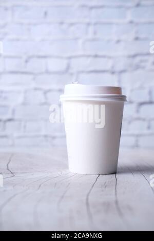 Coffee cup on wooden background with copy space. Stock Photo