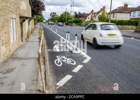 Chippenham, Wiltshire, UK. 5th August, 2020. Pictured is the new segregated cycleway along part of the A420 in Chippenham, the cycleway is the first of Wiltshire Council's road reallocation projects to be completed. It was built to make it easier and safer for pedestrians and cyclists to access shops, businesses and places of work. It is the first scheme to be complete in Wiltshire so far, with three others in progress one linking Winsley and Bradford on Avon; one in Salisbury linking Harnham to the city centre and a new cycleway in Trowbridge. Credit: Lynchpics/Alamy Live News Stock Photo