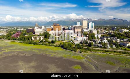 An aerial view into downtown Anchoragh from a perspective over the Coook Inlet Alaska Stock Photo