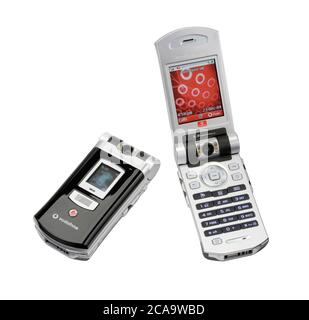 A Sony Ericsson mobile phone from year 2004. Vodafone tied contract telephone that has a flip open mechanism. Stock Photo