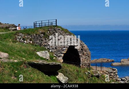 The Lime Kiln at Heddon Mouth on the North Devon Coast with a view of Wales on the horizon. Stock Photo