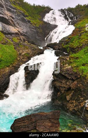 Kjosfossen Falls -cascading waterfall popular with tourists, accessible by a scenic train ride of Flåm - Myrdal railway.Rallarvegen,Myrdal, Norway Stock Photo
