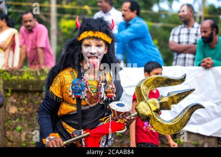 traditional kummatti folk dance performers during onam celebration,thrissur,kizhakkumpattukara kummatti,kerala,onam festival,india,pradeep subramanian Stock Photo