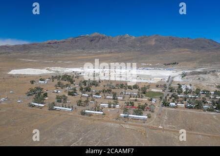 EMPIRE, NEVADA, UNITED STATES - Jul 04, 2020: Aerial photo of the company town of Empire and the gypsum mining operation adjacent to the residential a Stock Photo
