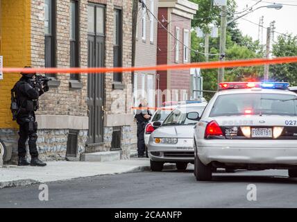 Tactical police on crime scene Stock Photo