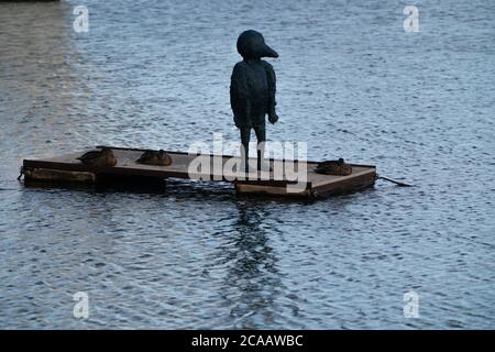 New lone sculpture Bird Boy installed on a pontoon in Royal Victoria Dock Stock Photo