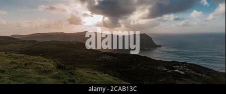 Panoramic view over the Cliffs of Horn Head in County Donegal, Ireland. Wild Atlantic Way. Golden hour. Stock Photo