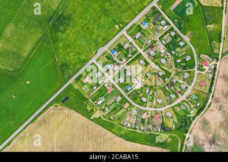 planned residential community in countryside. rural summer landscape, aerial top view Stock Photo