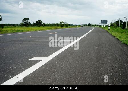 Asphaltic concrete road in Thailand Stock Photo