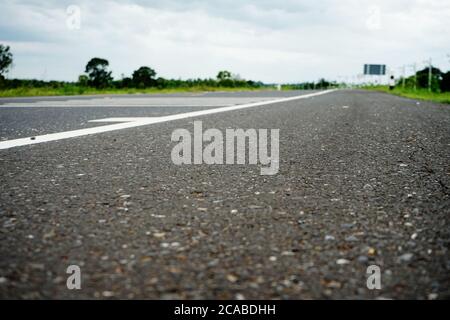 Asphaltic concrete road in Thailand Stock Photo