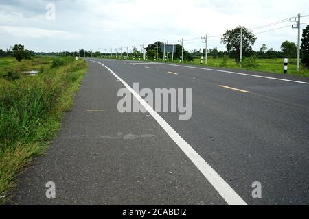 Asphaltic concrete road in Thailand Stock Photo