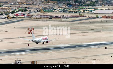 Ladakh, India - Spicejet Boeing 737 landing at Leh airport (Kushok Bakula Rimpochee Airport) view from Spituk Monastery in Ladakh, India. Stock Photo