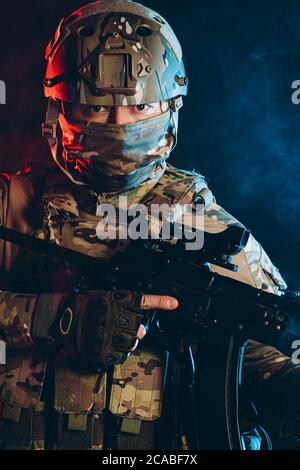Young handsome soldier (sniper) aiming a machine gun Stock Photo - Alamy