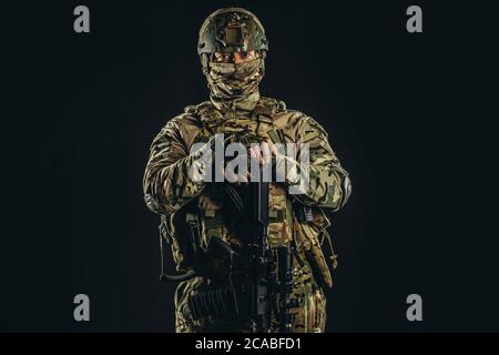Soldier Holding Rifle Isolated Over White Background Stock Photo - Alamy