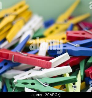 Closeup shot of colorful scattered clothespins Stock Photo