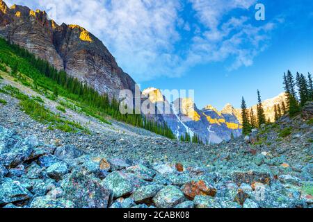 Scree slopes below Tower of Babel along the Consolation Lakes trail near Moraine Lake in Banff National Park, with boulder field and the Valley of Ten Stock Photo