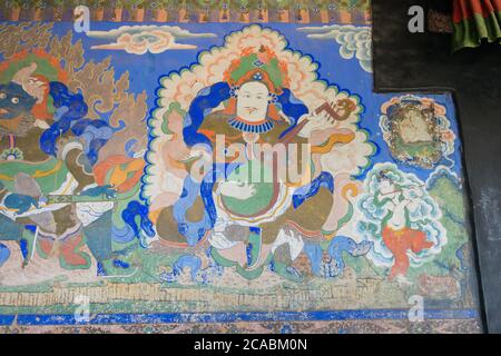 Ancient Mural at Thikse Monastery (Thikse  Gompa) in Ladakh, Jammu and Kashmir, India. The Monastery was originally built in 15th century. Stock Photo