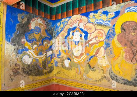 Ancient Mural at Thikse Monastery (Thikse  Gompa) in Ladakh, Jammu and Kashmir, India. The Monastery was originally built in 15th century. Stock Photo