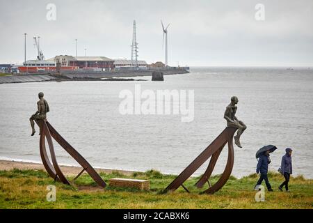 Heysham sculpture of SHIP and two figures at Half Moon Bay by artist Anna Gillespie near the port Stock Photo