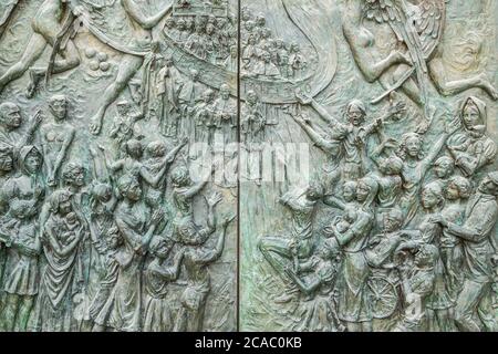 Bronze door of Almudena cathedral in Madrid, Spain. Stock Photo