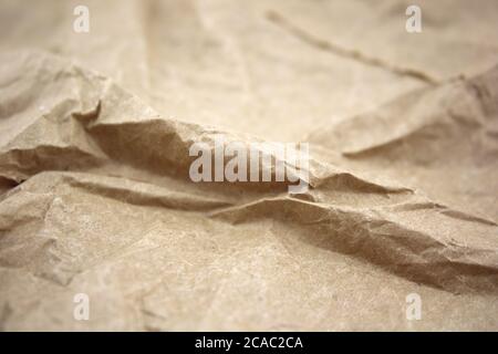 Macro Brown Crumpled Paper with faded edge Background Stock Photo