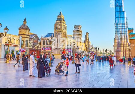 DUBAI, UAE - MARCH 5, 2020: The Global Village Dubai boasts replicas of famous European buildings - London Big Ben, Pisa Leaning Tower, Rome Colosseum Stock Photo