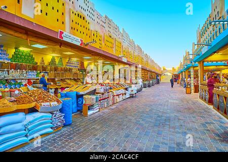 DUBAI, UAE - MARCH 5, 2020: The line of spice stalls in Yemen pavilion of Global Village Dubai with wide range of aroma Eastern spices, herbs and trad Stock Photo