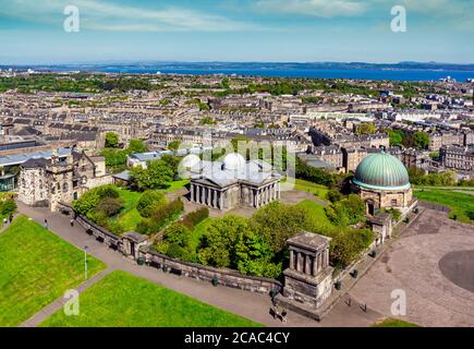 The Old City Observatory on Calton Hill in Edinburgh Scotland viewed from the Nelson Monument with views towards the Firth of Forth Stock Photo