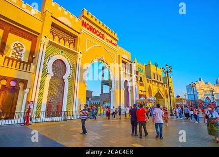 DUBAI, UAE - MARCH 5, 2020: The Arabic style portal of Morocco pavilion of Global Village Dubai with horseshoe arch, Islamic patterns and reliefs, on Stock Photo