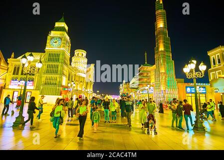 DUBAI, UAE - MARCH 5, 2020: The whole world is placed in one alley of Global Village - here is London Big Ben, Dubai Burj Khalifa, Pisa Leaning Tower, Stock Photo