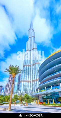 DUBAI, UAE - MARCH 3, 2020: The walking boulevard at Dubai Mall shopping center with Burj Khalifa building on background, on March 3 in Dubai Stock Photo
