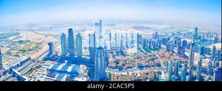 DUBAI, UAE - MARCH 3, 2020: Panorama of the modern Downtown district of Dubai from Burj Khalifa, on March 3 in Dubai