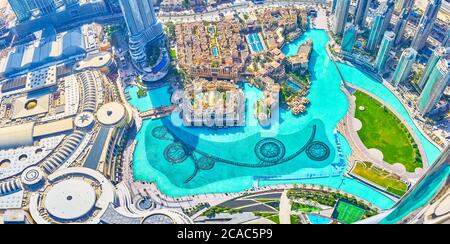 DUBAI, UAE - MARCH 3, 2020: The view from Burj Khalifa on large Burj Lake with its famous constructions for evening fountain show, on March 3 in Dubai Stock Photo