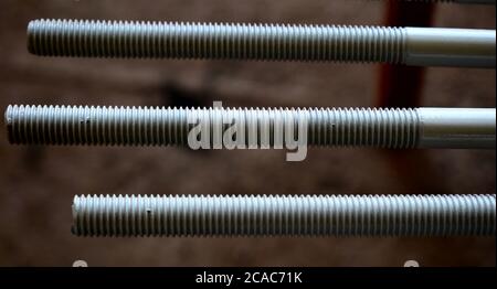 steel Structural parts. Threaded round bars in the paint shop . Sag rod ...