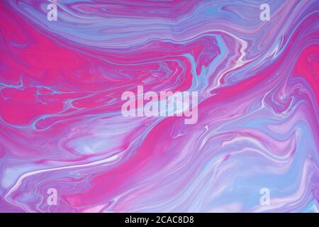 Acrylic paint fluid in trend magenta and pink color mix background Stock Photo