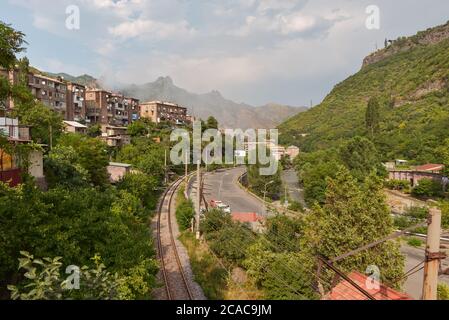 Alaverdi / Armenia - July 20, 2019: Soviet style buildings and vehicles from the streets of Alaverdi Stock Photo