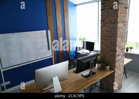 Modern empty office interior with brick wall Stock Photo