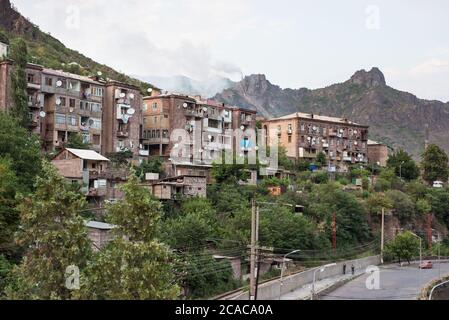 Alaverdi / Armenia - July 20, 2019: Soviet style buildings and vehicles from the streets of Alaverdi Stock Photo