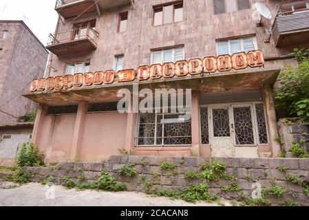 Alaverdi / Armenia - July 20, 2019: Soviet style buildings and vehicles from the streets of Alaverdi Stock Photo