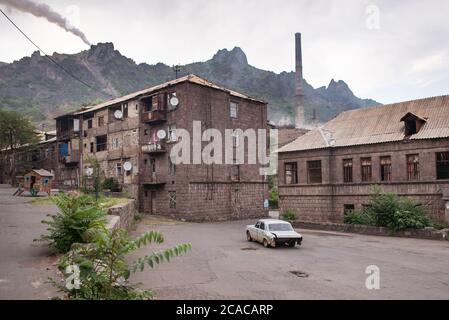 Alaverdi / Armenia - July 20, 2019: Soviet style buildings and vehicles from the streets of Alaverdi Stock Photo