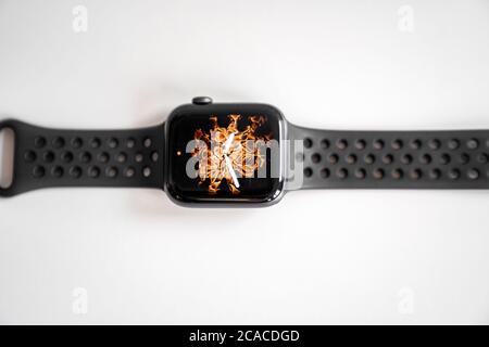 Isolated top view of a black smartwatch on white background Stock Photo